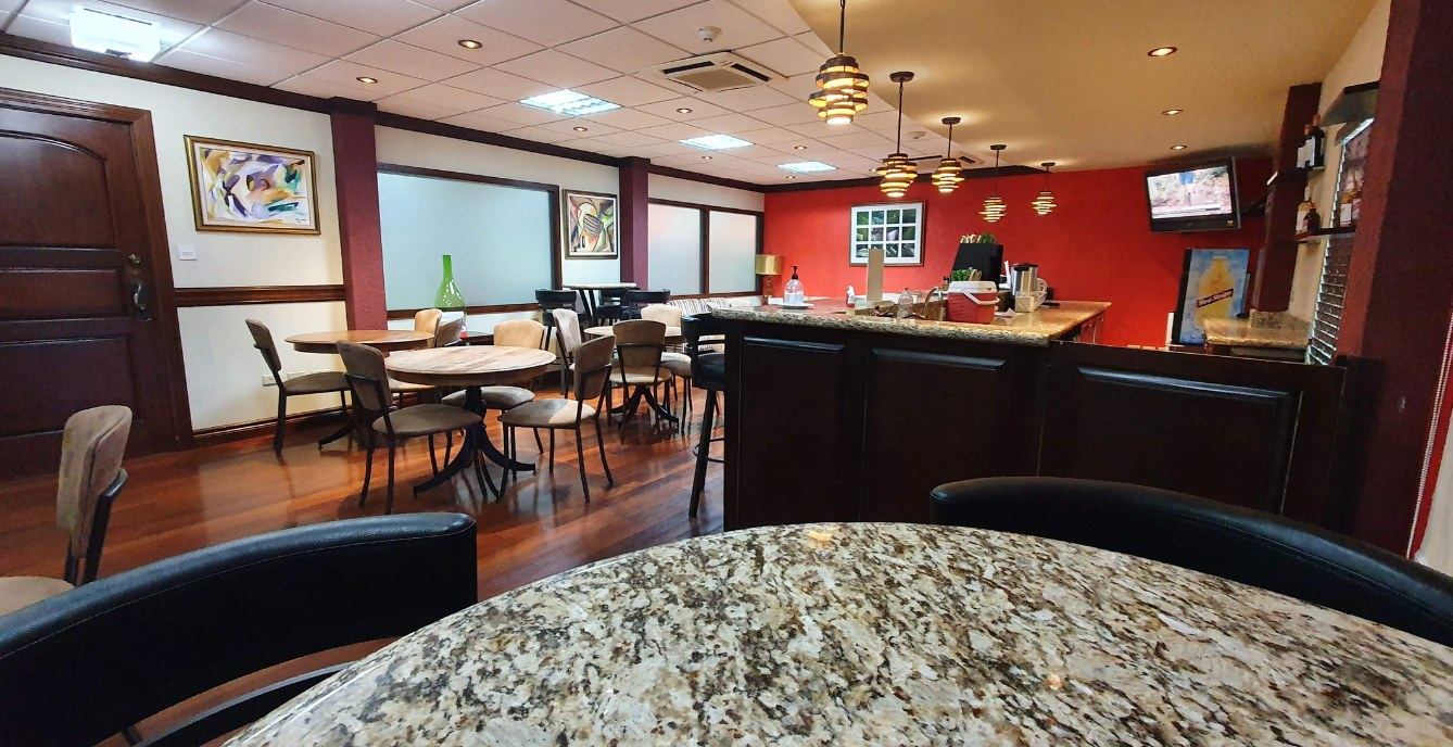The lounge bar at Club Kingston, Norman Manley International