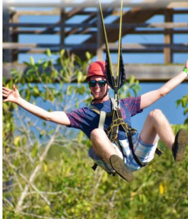 A rider on the zipline at JamWest
