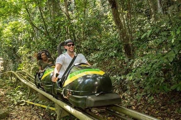 Two riders on the Mystic Mountain bobsled