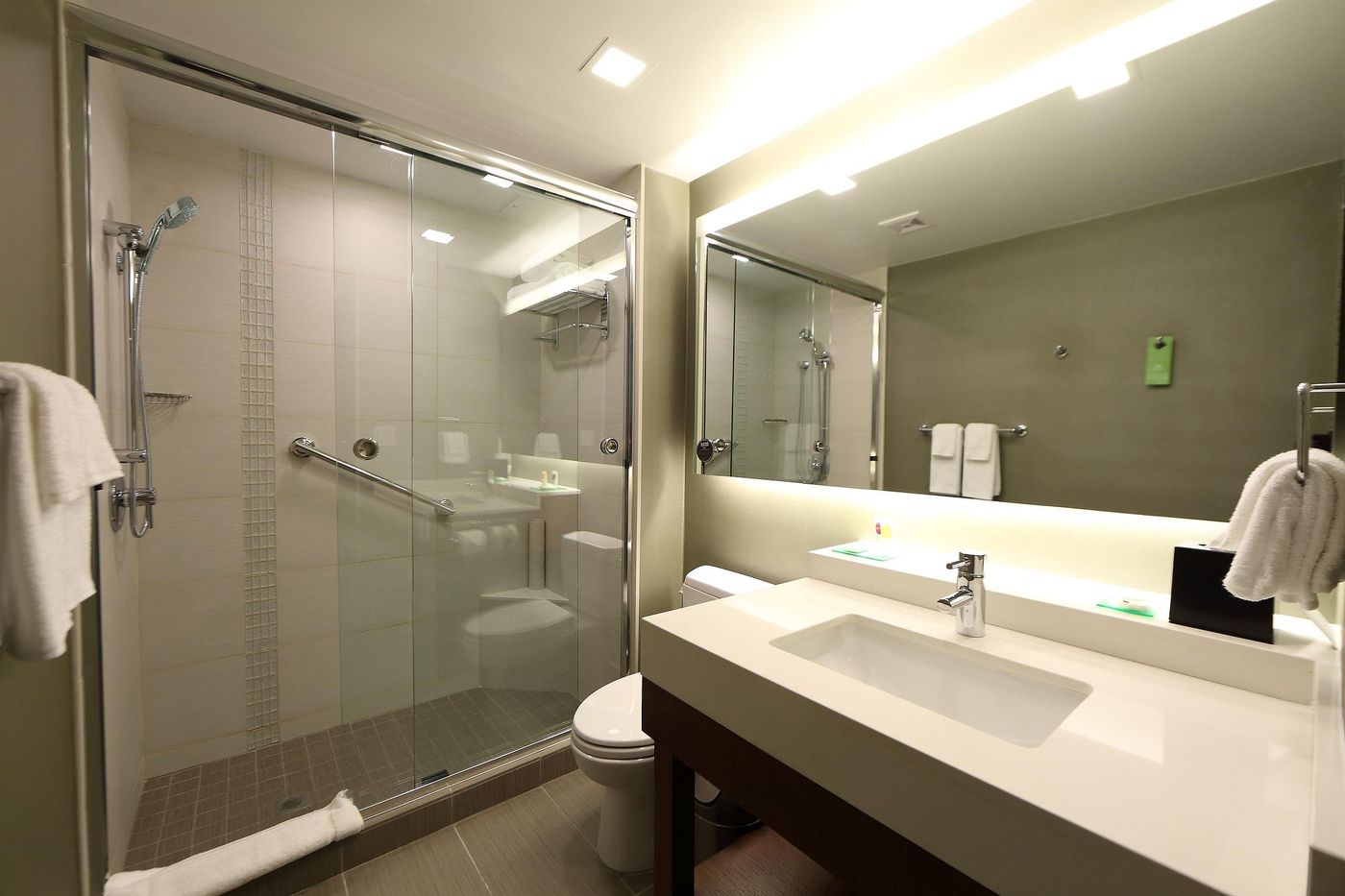 A bathroom with a walk-in shower